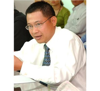 Dr. Ly Quy Trung is at a seminar