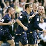 Old Firm stars (from L, R) Scott Brown, Lee McCulloch, Alan Hutton and Kris Boyd celebrate a Scotland goal (Photo: AFP)