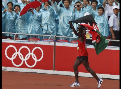 Wansiru celebrates after winning gold medal at Olympic