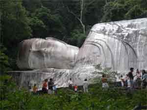 Larger than life: The Buddha reclines serenely on Ta Cu Mountain