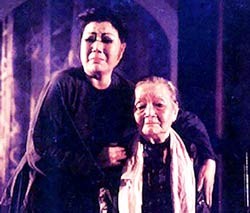 Actress Kim Cuong (L) and her mother People's Artist Bay Nam, in the play "Durian Leaf".