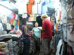 Bargain hunter: A visitor checks out T-shirts