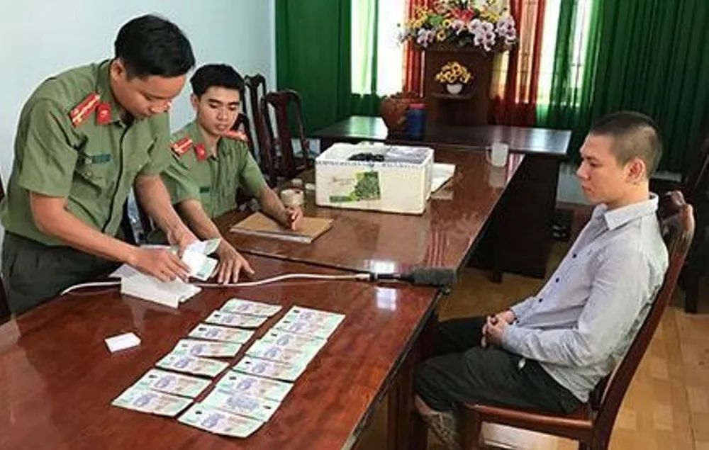 Truy tố 16 đối tượng trong đường dây làm tiền giả quy mô lớn ảnh 1