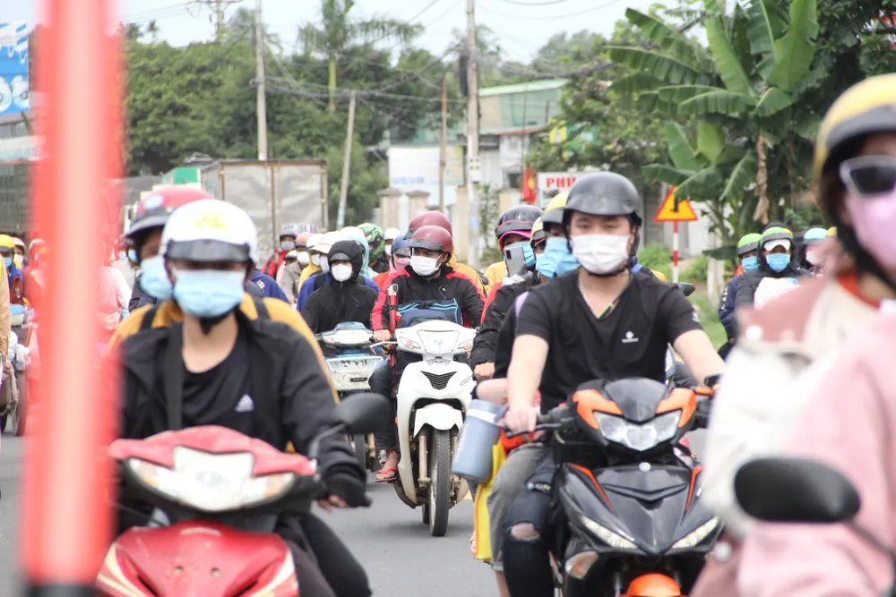 Đắk Lắk, Đắk Nông tiếp nhận hàng ngàn người dân từ các tỉnh thành phía Nam trở về ảnh 6