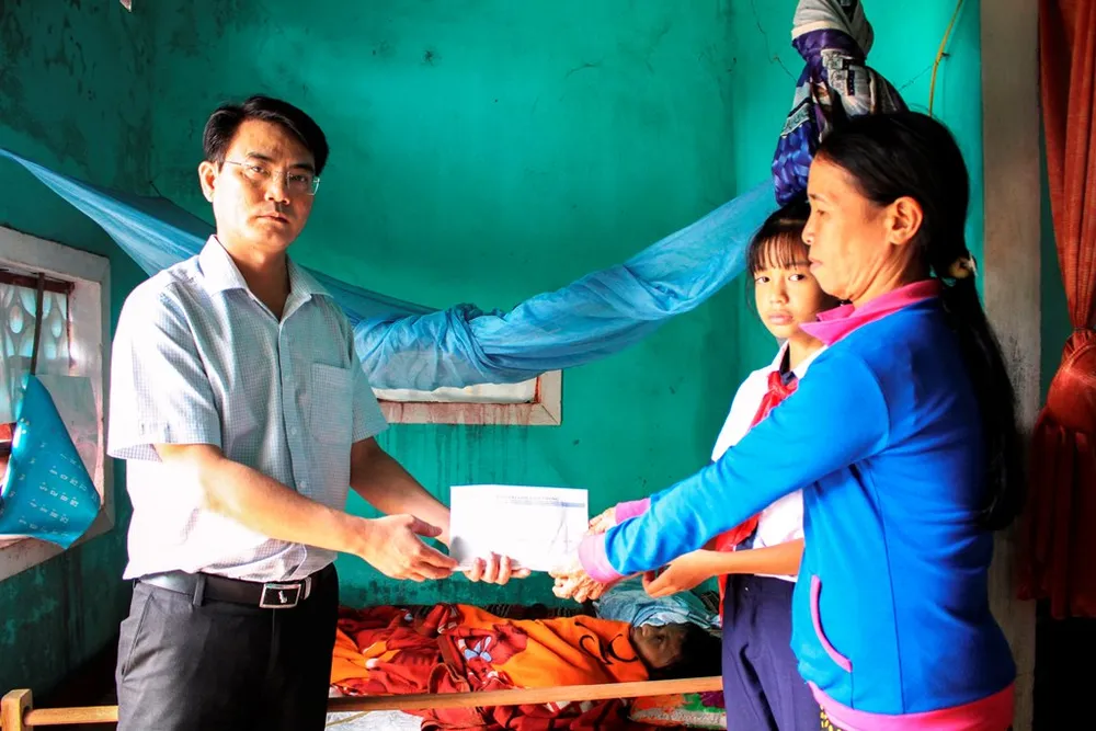 Báo SGGP trao tiền hỗ trợ cho 2 hoàn cảnh khó khăn ảnh 1