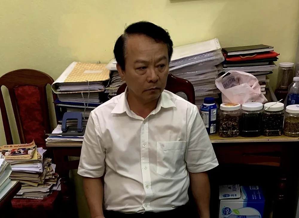 Ông Võ Đình Sớm lúc bị bắt. Ảnh: ĐC Ông Võ Đình Sớm lúc bị bắt. Ảnh: ĐC