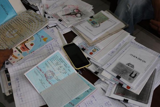 Online loan shark gang found in HCMC, prosecuted ảnh 2