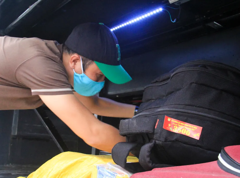 Đà Nẵng hỗ trợ xe đưa 3.000 lao động về quê đón tết ảnh 7