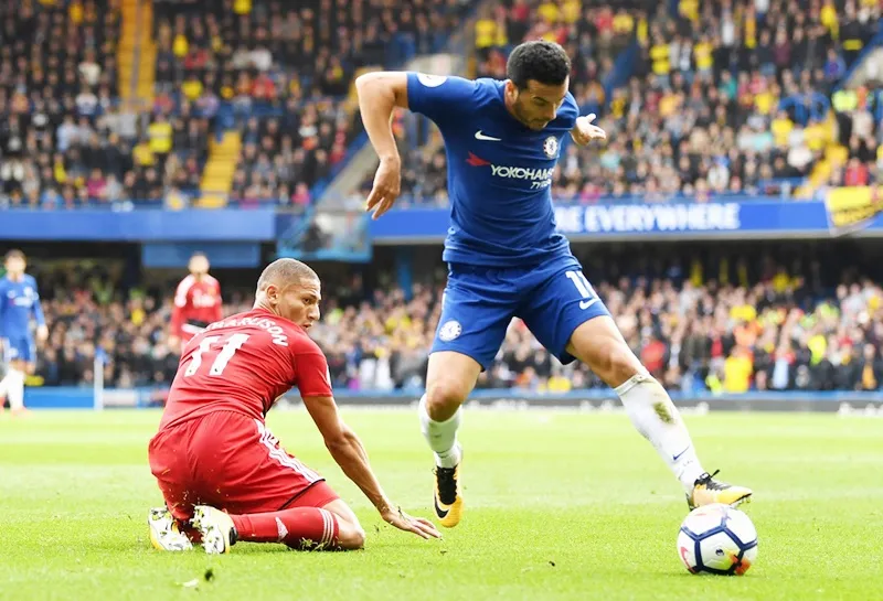 Pedro (xanh) và đồng đội có trận đấu đầy kịch tính trước Watford: Ảnh: Getty Images.