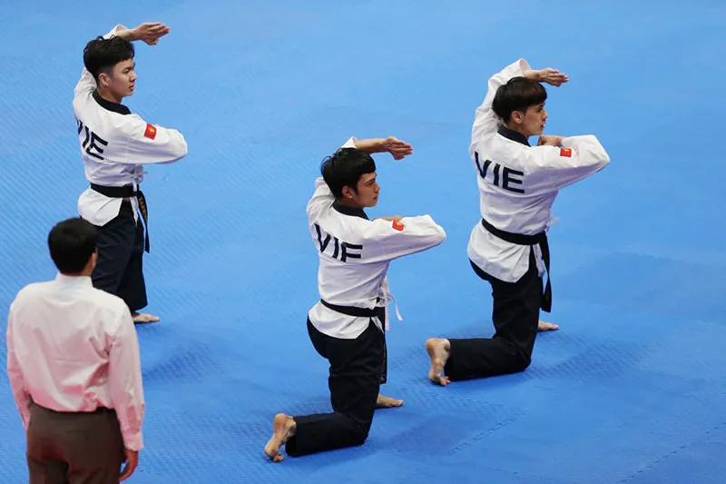 Đội tuyển quyền nam giành huy chương đầu tiên cho Việt Nam ảnh 2