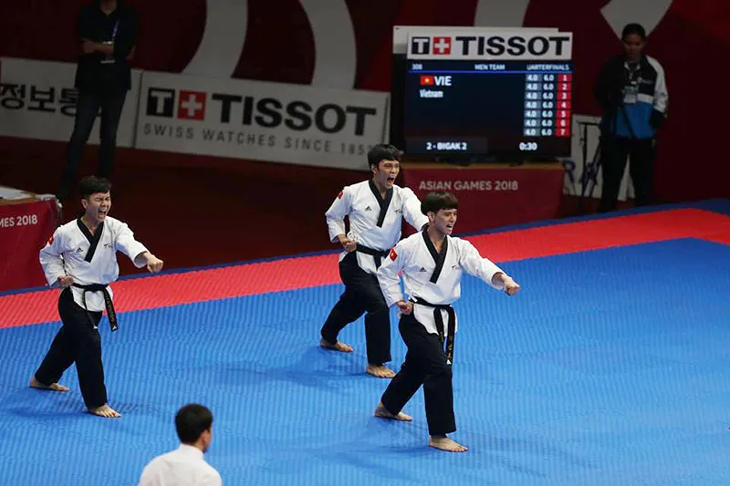 Đội tuyển quyền nam giành huy chương đầu tiên cho Việt Nam ảnh 1