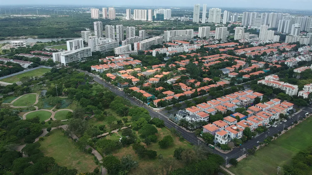 Thảm xanh trong đô thị giúp thành phố thoát nước tốt hơn. Ảnh: CAO THĂNG