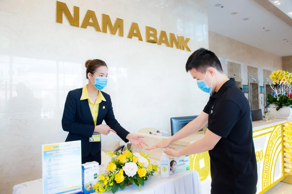 Nhân viên ngân hàng Nam A phòng tránh virus Corona ảnh 1