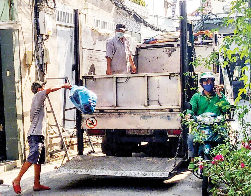 Băn khoăn... cân rác tính tiền ảnh 1