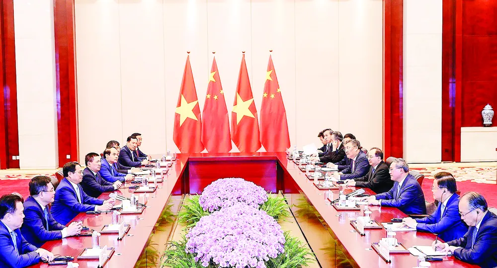 Thủ tướng Phạm Minh Chính hội đàm với Thủ tướng Lý Cường. Ảnh: TTXVN