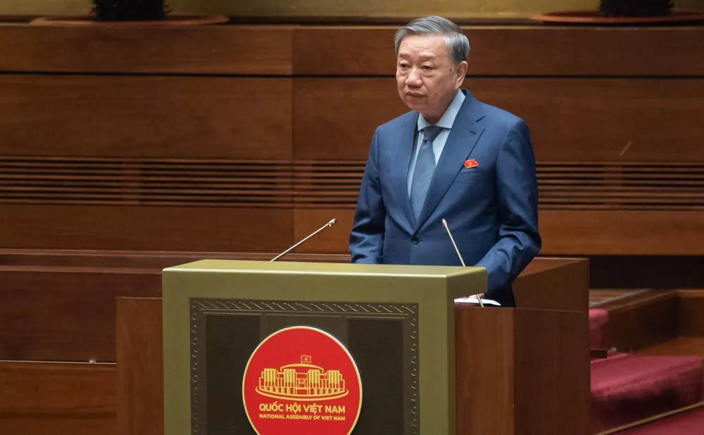 Bộ trưởng Bộ Công an Tô Lâm, trình bày Báo cáo công tác phòng, chống tội phạm và vi phạm pháp luật năm 2023. Ảnh: VIẾT CHUNG 