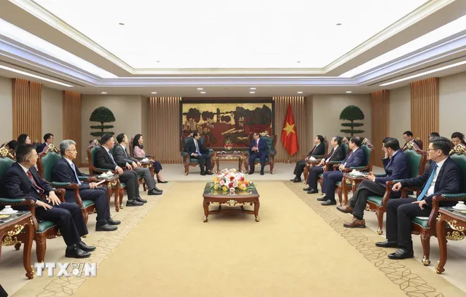 Thủ tướng Phạm Minh Chính tiếp Đại sứ Trung Quốc tại Việt Nam Hà Vĩ. Ảnh: TTXVN