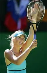 Henin và Sharapova vào bán kết