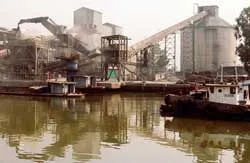 Xi măng điêu đứng vì than tăng giá