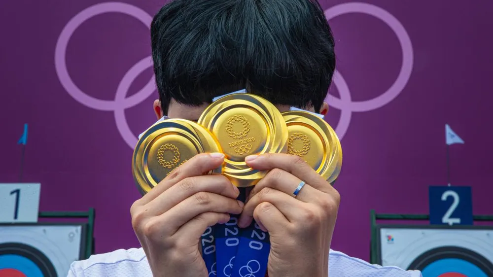 Hành trình “săn vàng” của cung thủ An San ảnh 1