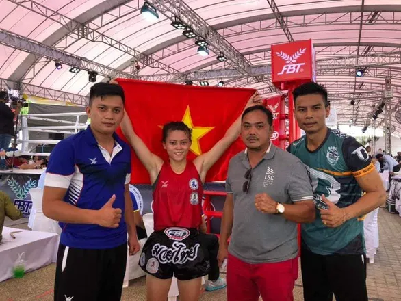 Nữ võ sĩ Huỳnh Hà Hữu Hiếu giành HCV hạng 45kg tại giải VĐTG 2019. Ảnh: BẢO LONG