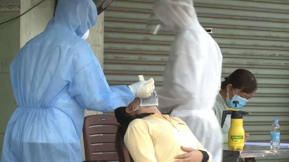 Thêm 2 ca nghi mắc Covid- 19, Bình Phước phong tỏa nhiều khu vực ở huyện Chơn Thành ảnh 1