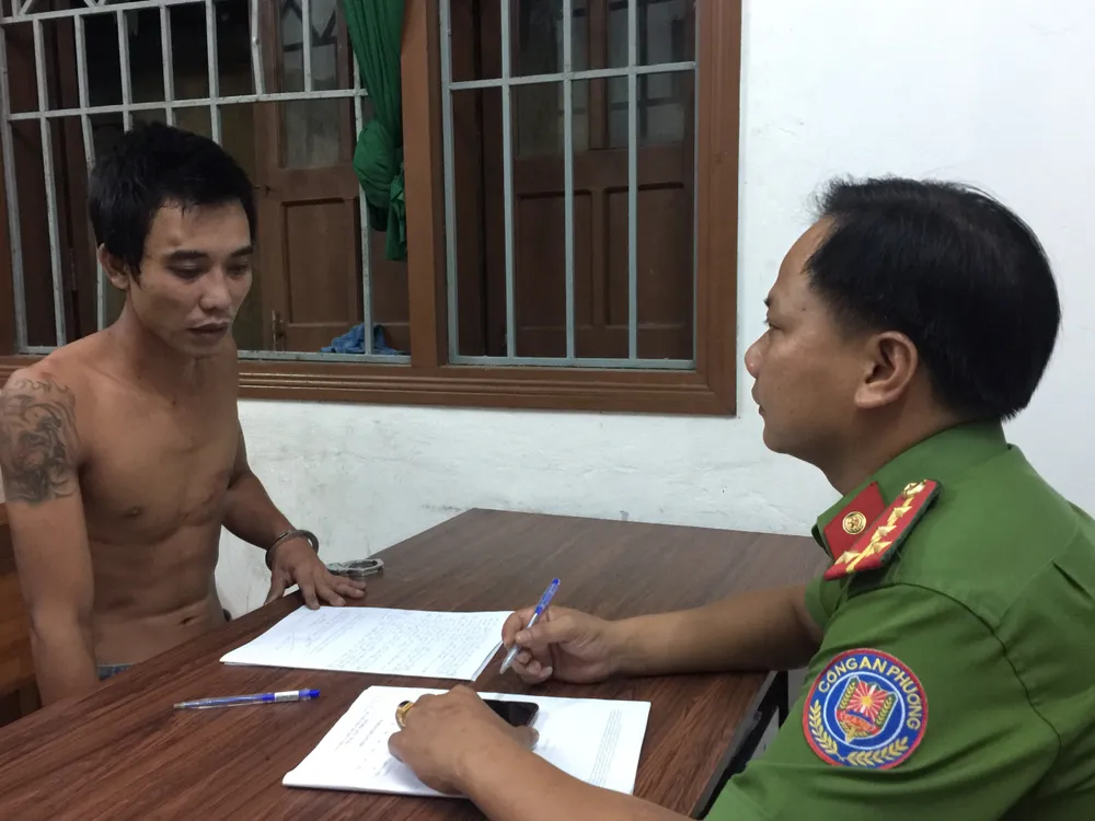 2 công an bị chém khi đang làm nhiệm vụ ảnh 2