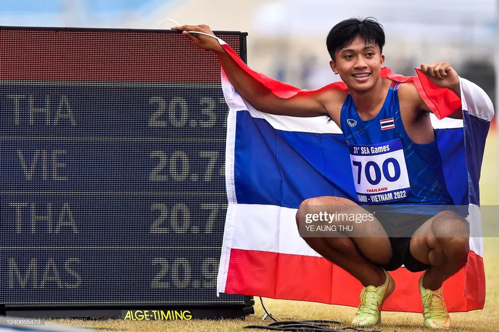 Thần đồng điền kinh Thái Lan Puripol Boonson hụt vàng, nhưng lập kỷ lục thế giới ảnh 1