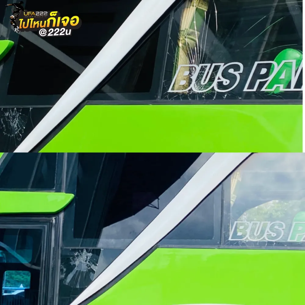 Cửa kính xe buýt của đội tuyển Thái Lan bị vỡ