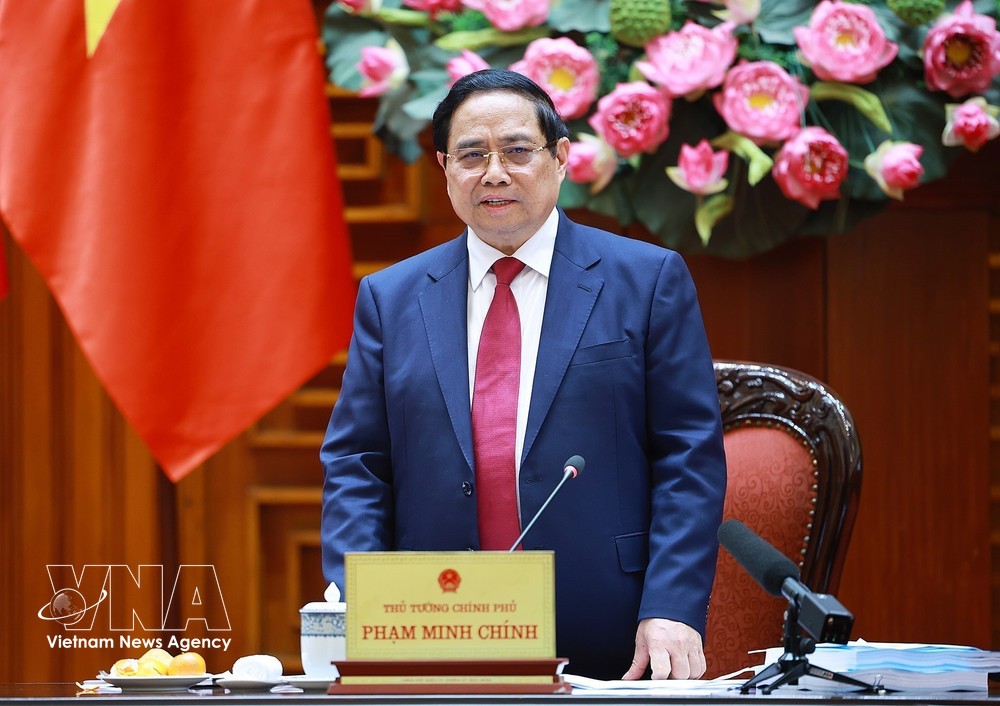 范明政总理在会议上发表讲话。