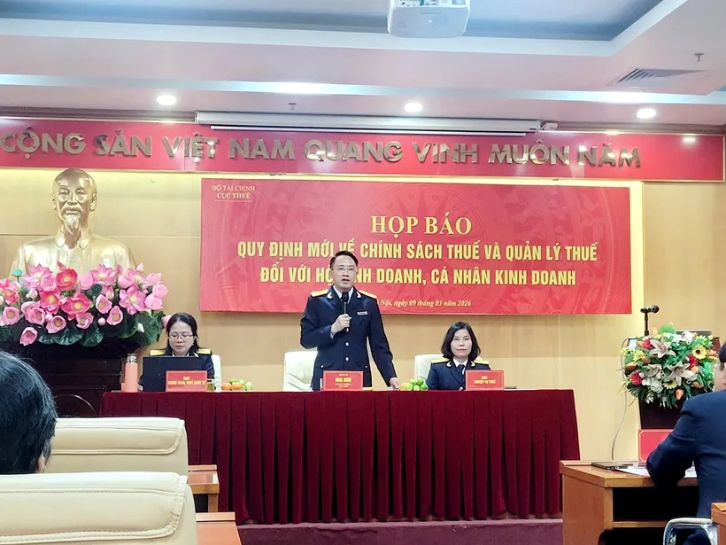 Ông Mai Sơn, Phó Cục trưởng Cục Thuế phát biểu tại cuộc họp báo, ngày 9-3. Ảnh: L.T