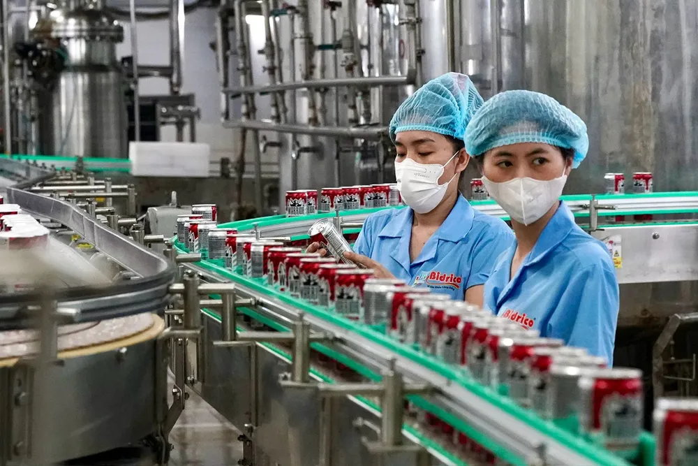 Dây chuyền sản xuất theo tiêu chuẩn Halal của Công ty TNHH SX-TM Tân Quang Minh - BIDRICO, Khu công nghiệp Vĩnh Lộc, huyện Bình Chánh, TPHCM. Ảnh: HOÀNG HÙNG