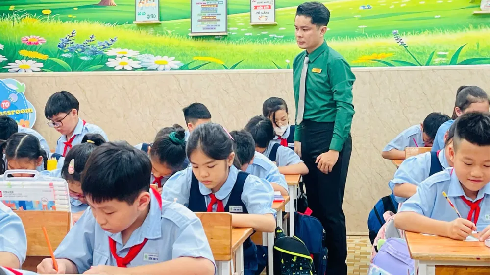 Học sinh Trường Tiểu học Lương Định Của (phường Bàn Cờ, TPHCM) trong một giờ học. Ảnh: THU TÂM 