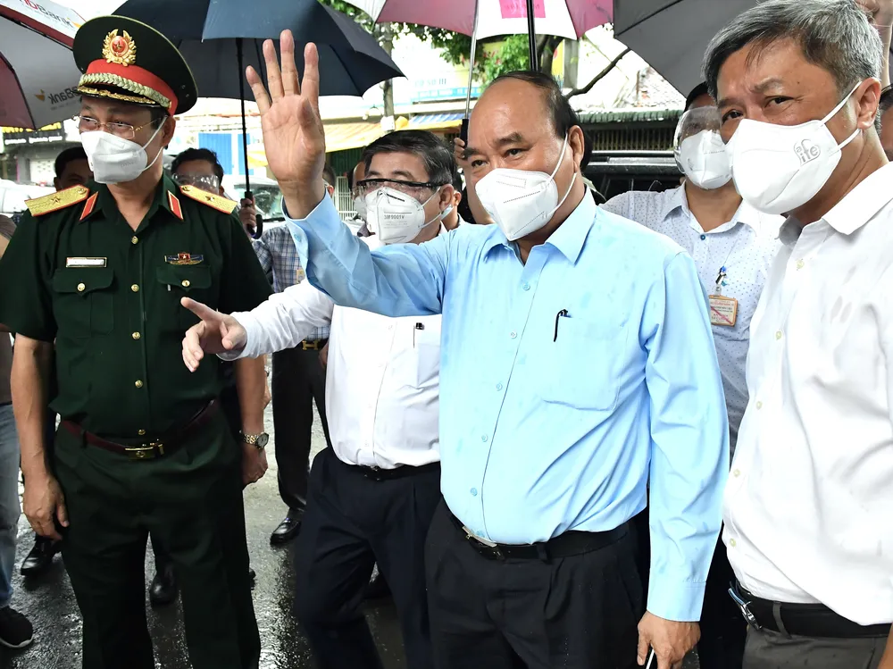 Chủ tịch nước Nguyễn Xuân Phúc đồng ý chủ trương giãn cách tại TPHCM thêm một thời gian nữa ảnh 5