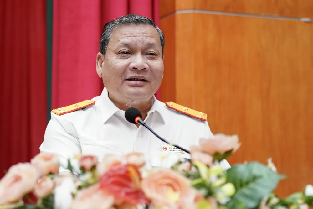 Phó Tổng cục trưởng Tổng cục Thuế Phi Vân Tuấn phát biểu tại hội nghị. Ảnh: HOÀNG HÙNG