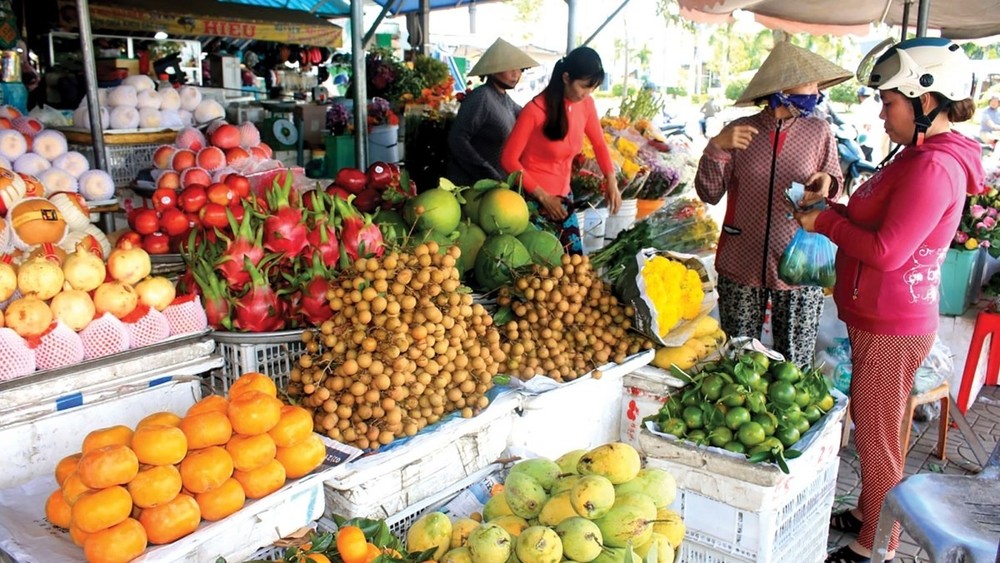 从正月初四起，市场开始恢复正常，初五当天更为明显。图自越通社
