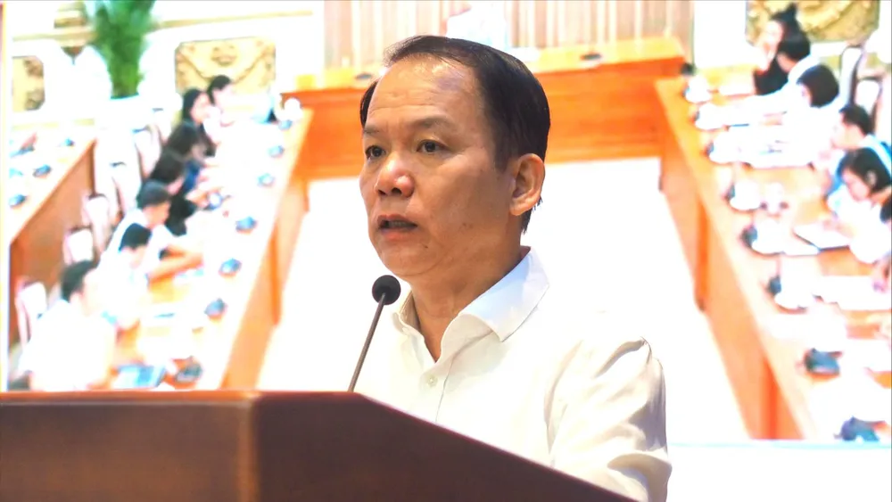 Bộ trưởng Bộ Tư pháp Hoàng Thanh Tùng phát biểu tại hội nghị. Ảnh: CẨM HÀ 
