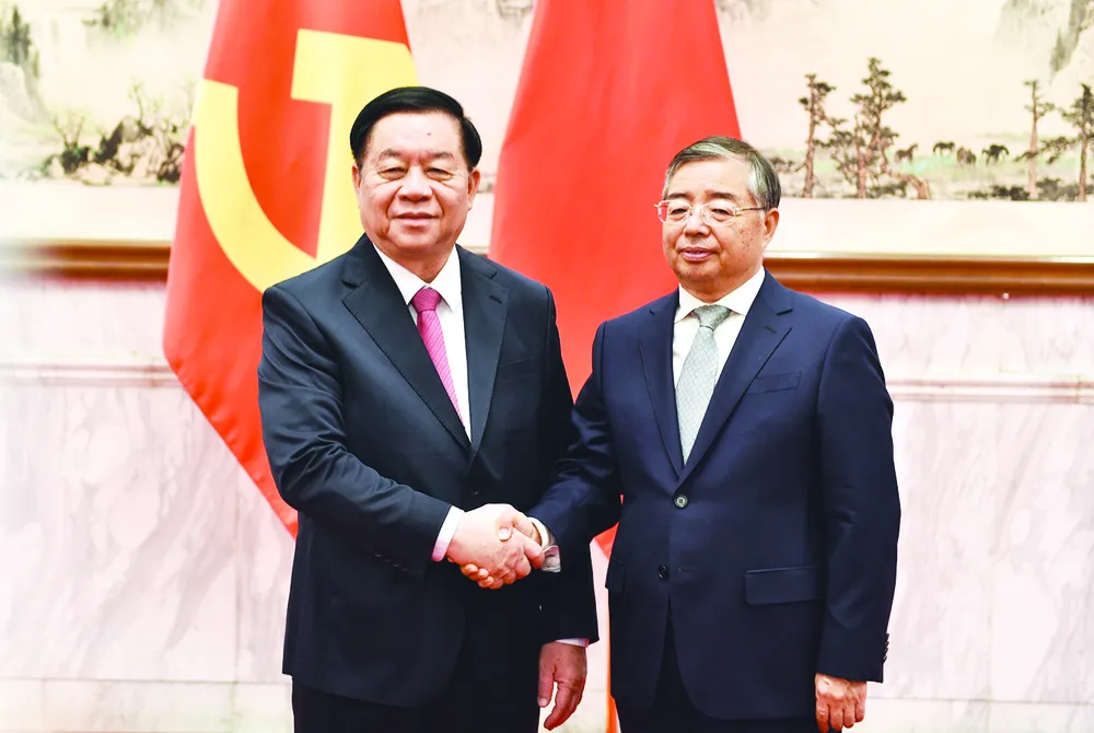 Đồng chí Nguyễn Trọng Nghĩa gặp, hội đàm với đồng chí Lý Thư Lỗi, Ủy viên Bộ Chính trị, Bí thư Ban Bí thư, Trưởng Ban Tuyên truyền Trung ương Đảng Cộng sản Trung Quốc Ảnh TTXVN