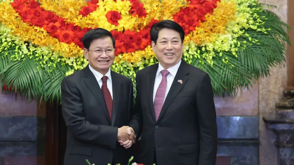 Chủ tịch nước Lương Cường hội kiến với Tổng Bí thư, Chủ tịch nước Lào Thongloun Sisoulith ngày 26-1. Ảnh: QUANG PHÚC