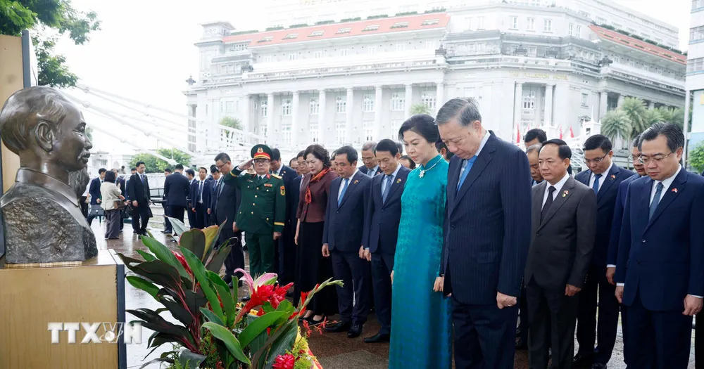 ttxvn-tong-bi-thu-chu-tich-nuoc-to-lam-va-phu-nhan-cung-doan-dai-bieu-cap-cao-viet-nam-dang-hoa-tai-tuong-dai-chu-tich-ho-chi-minh4-8032.jpg