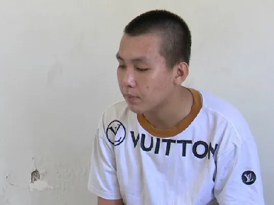 Lê Nhựt Trường khi bị bắt. Ảnh: LÊ HOÀI Lê Nhựt Trường khi bị bắt. Ảnh: LÊ HOÀI