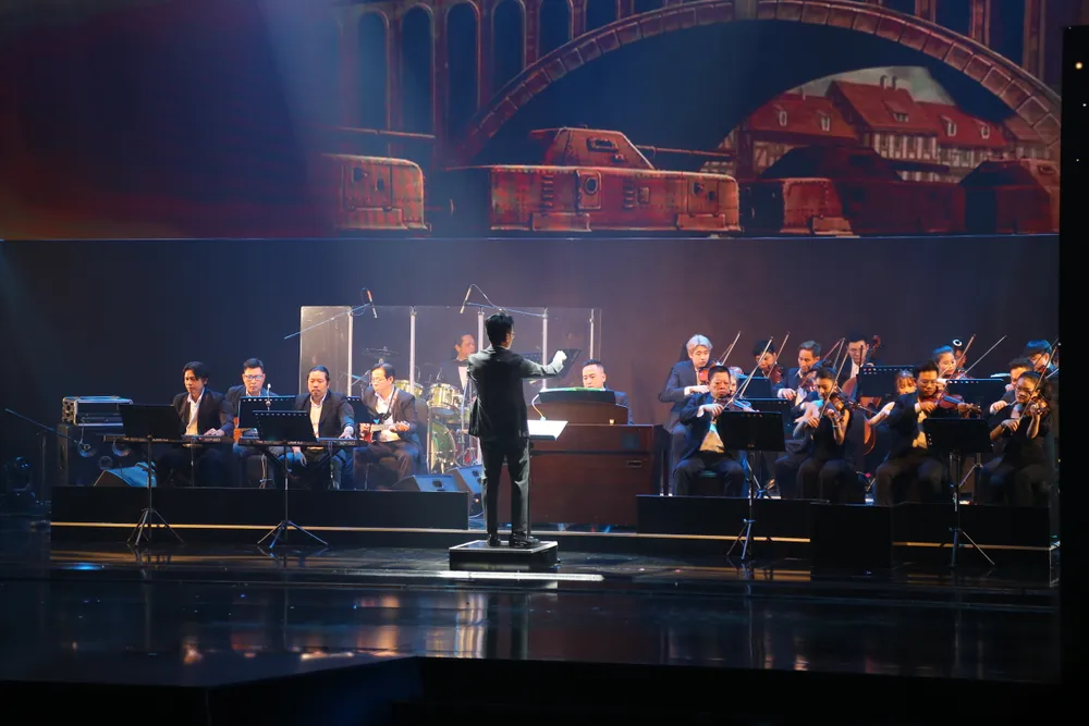 Dàn nhạc giao hưởng Saigon Pops Orchestra dưới sự chỉ huy của nhạc trưởng Trần Nhật Minh. Ảnh: PHẠM NGA Dàn nhạc giao hưởng Saigon Pops Orchestra dưới sự chỉ huy của nhạc trưởng Trần Nhật Minh. Ảnh: PHẠM NGA