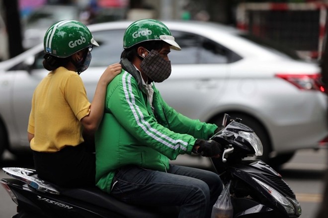 Grab网约车加收春节服务费