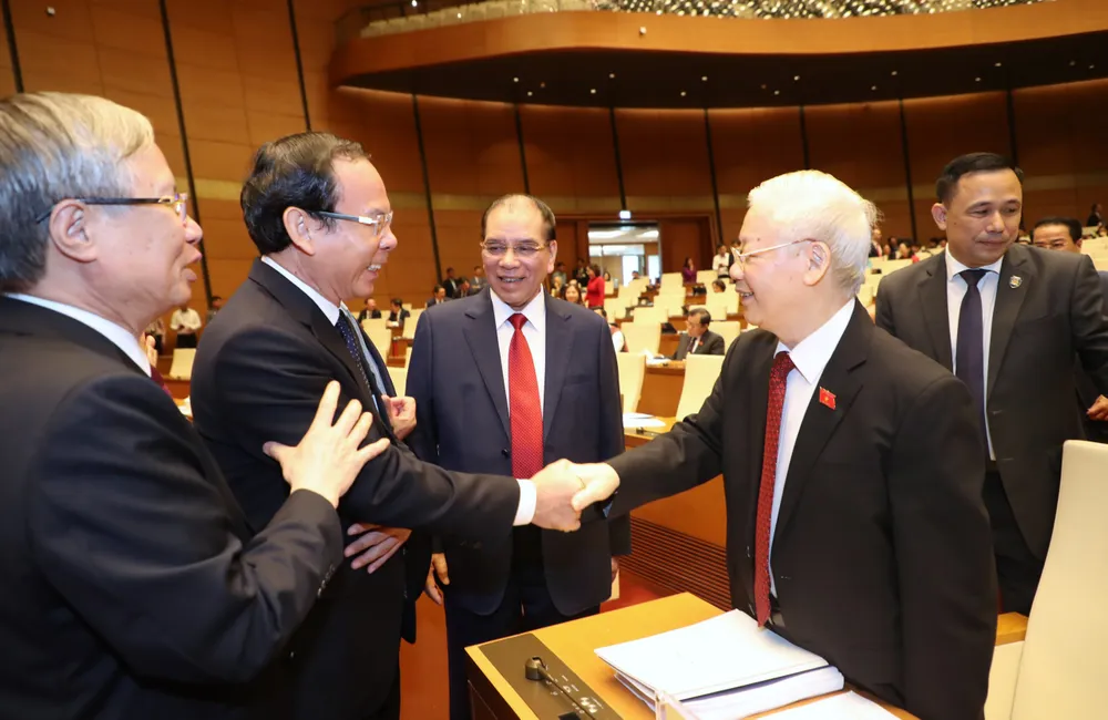 Tổng Bí thư Nguyễn Phú Trọng và Bí thư Thành ủy TPHCM Nguyễn Văn Nên tại phiên khai mạc kỳ họp thứ 5, Quốc hội khóa XV, sáng 22-5. Ảnh: QUANG PHÚC