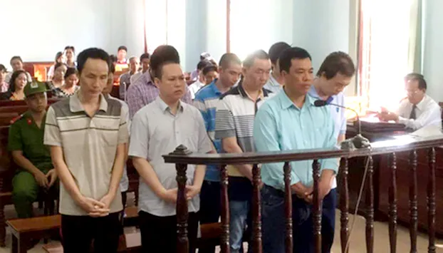 Các bị cáo tại phiên tòa sáng 11-7. Ảnh: LÊ PHƯƠNG