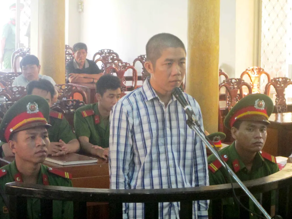 Cao Quốc phong trước vành móng ngựa. Ảnh: NHƯ NGUYỄN