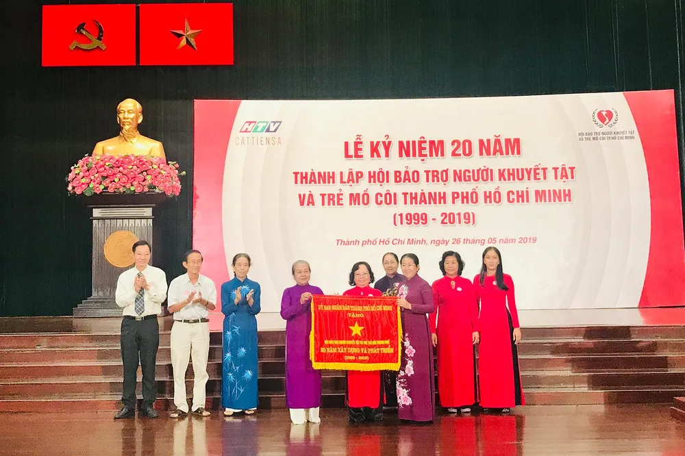 Gần 138 tỷ đồng hỗ trợ cho 262.120 người khuyết tật và trẻ mồ côi ảnh 1