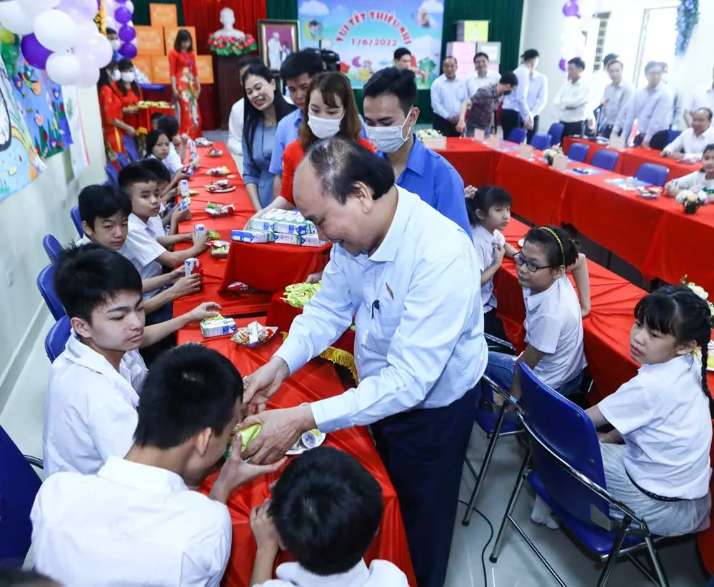 Chủ tịch nước Nguyễn Xuân Phúc: Chăm sóc trẻ em khuyết tật hòa nhập cộng đồng ảnh 3