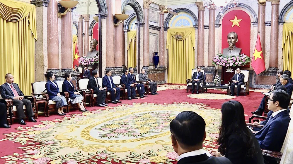Chủ tịch nước Nguyễn Xuân Phúc tiếp Viện trưởng Viện Kiểm sát nhân dân tối cao Lào Xayxana Khotphouthone ảnh 3