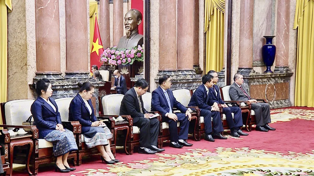Chủ tịch nước Nguyễn Xuân Phúc tiếp Viện trưởng Viện Kiểm sát nhân dân tối cao Lào Xayxana Khotphouthone ảnh 4